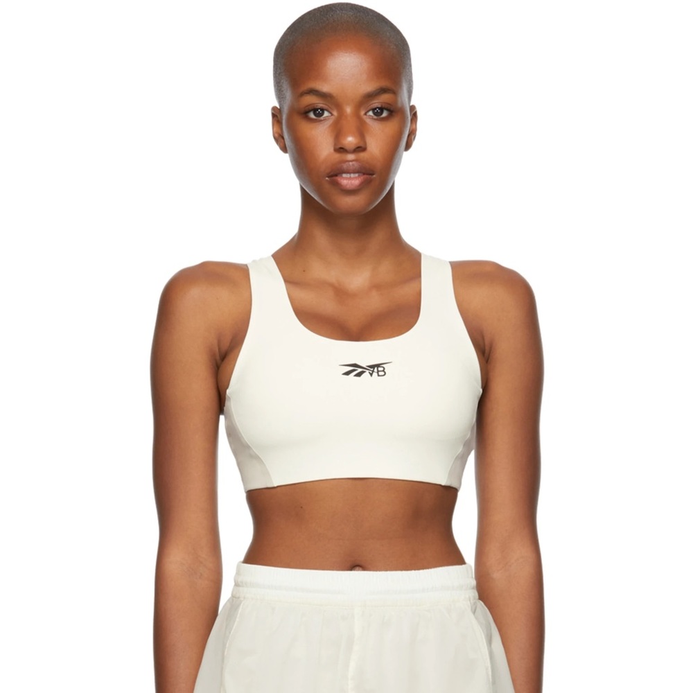 VB for Reebok. Stretch sports bra colorblocked in off-white and grey.